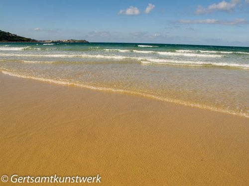 Clear waters caressing golden sands