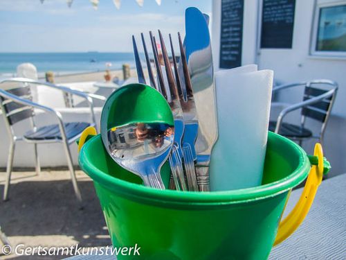 Cutlery in a bucket