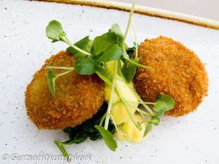 Brixham crab cakes, wilted kale