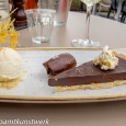 Salted chocolate tart, caramel popcorn, vanilla ice cream