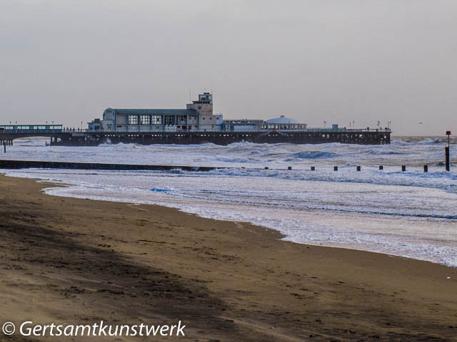 Pier in lively sea