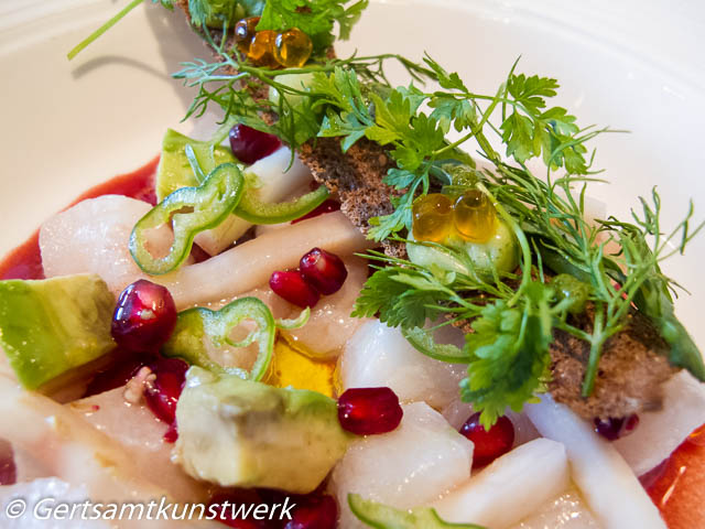Monkfish ceviche and pomegranate dressing